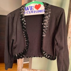 Stylish beaded cover for wedding or formal event.